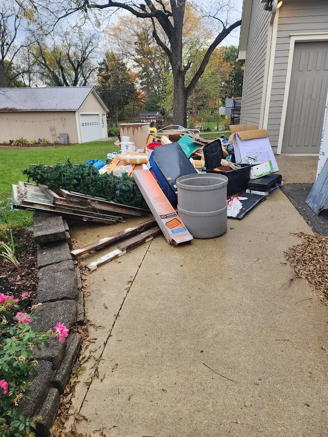 Dumpster being loaded with debris for 30 Yard Dumpster Rental in Pittstown